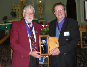 KOFC4949 GK Guenter A. Rieger receives the Silver Rose from GK BernieLutes