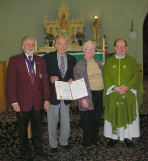 KOFC 4949 Val and Pat Dorigo celebrating 50 years of marriage. Left. GK Guenter A. Rieger, Val and Pat Dorigo, Father Dale Normandeau. Click on picture to watch video